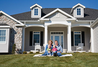 Testimonials - Couple in front of home